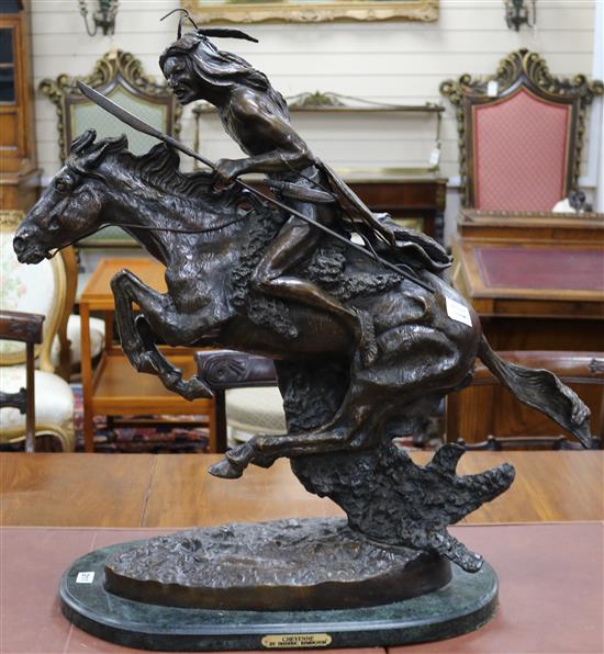 After Frederick Remington. A bronze group, Cheyenne, on black marble plinth height 80cm